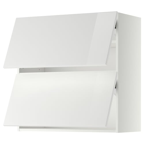 White modern kitchen cabinet with sleek, high-gloss finish and angular design.