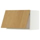 This image shows a wooden cabinet door from ikeas METOD series. The door is light brown with a simple rectangular design.