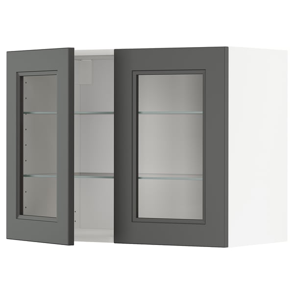 Gray glass-door wall cabinet, part of the METOD kitchen system, featuring adjustable shelves behind frosted glass doors with snap-on hinges.