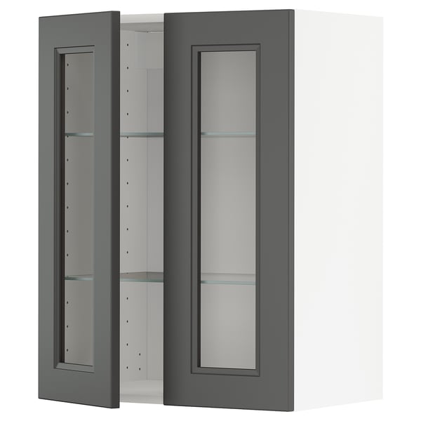 A dark grey METOD kitchen wall cabinet with clear glass doors displaying an open shelf inside.