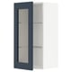 Blue glass door open on white cabinet, adjustable shelves.