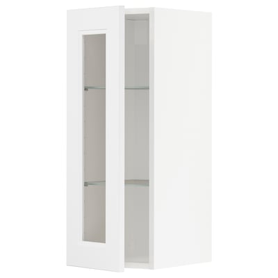 White METOD cabinet with glass doors and shelves.