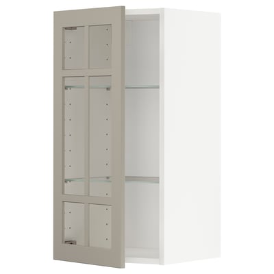 An open, beige METOD wall cabinet with glass shelves from ikea.