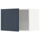Blue METOD kitchen cabinet with white interior.