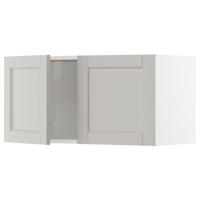 METOD kitchen cabinet: white, square, bevelled edges, with one open door, solid birch frame.