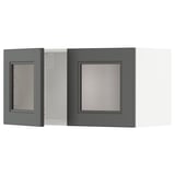 Two grey kitchen cabinet doors, one open, revealing an interior; sleek, modern design with a central panel.
