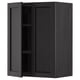 Black stained kitchen cabinet with beveled edges and adjustable shelf.