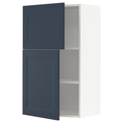 Blue METOD kitchen cabinet with two doors open, showcasing storage space.