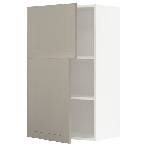 A beige METOD kitchen cabinet with two doors and an adjustable shelf. It a modern, rectangular design.
