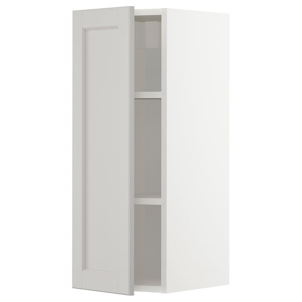 White METOD wall cabinet, rectangular, modern design with gray shelves.