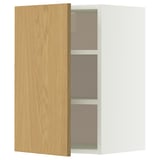 An open white METOD wall cabinet with a light oak door, featuring two shelves inside.