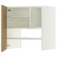 A white ikea METOD cabinet with oak accents and adjustable shelves.