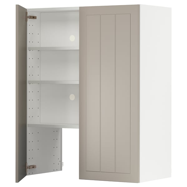 A beige ikea METOD kitchen cabinet with a shaker-style design and adjustable shelves.