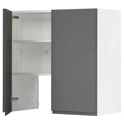 Black and white modern cabinet, left door open, exposed shelves against a white backdrop.