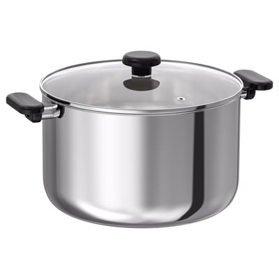 Silver stewpot with black handles, glass lid.
