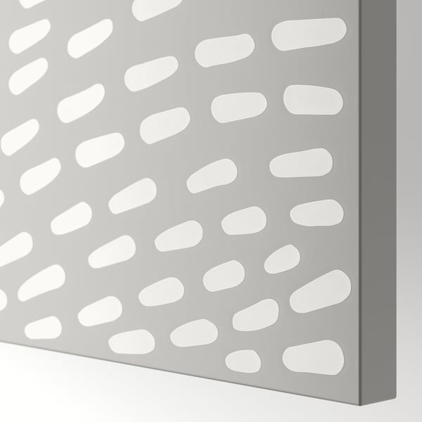 Grey metal sheet with uniformly spaced oval holes, showcasing precision and quality craftsmanship.