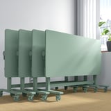Foldable MITTZON tables on wheels in room, ideal for collaboration.