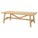 MÖCKELBY rectangular dining table, natural wood, sturdy oak legs, simple design.
