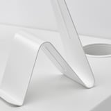 White metal stand, sleek minimalist design, part of modern furniture series.