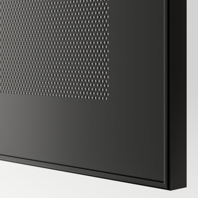 Close-up of black MÖRTVIKEN metal mesh panel; sleek, modern design for remote control signal passage.