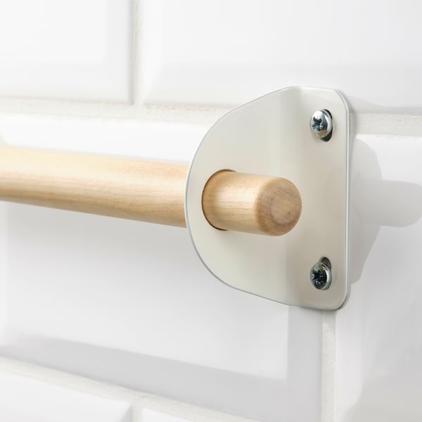 Close-up of sturdy, well-crafted wooden rail securely fastened with metal brackets, showcasing high-quality materials and precise design.