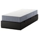 Option: Black NORDLI bed frame with drawers and grey mattress.