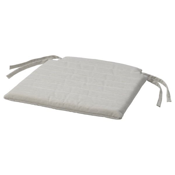 A light gray NORDVIKEN chair cushion with ribbon ties and a zipper for easy washing.