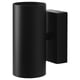 Option: Black modern wall lamp NYMÅNE with cylindrical shade, emitting light upward and downward, made of aluminum and steel with a powder-coated finish.