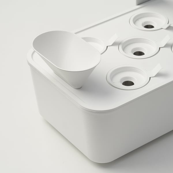 Modern indoor gardening kit with adjustable led lamp, white plastic design, perfect for small spaces.