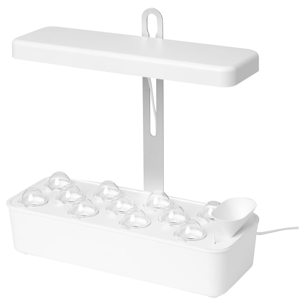 NYSÄTTRA indoor herb kit: white, rectangular, with adjustable lamp and multiple growth chambers.