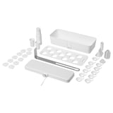 A white indoor plant growing kit, including a lamp, trays, and various accessories.