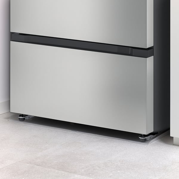 NYTTIG floor protector under refrigerator, guards against leaks.