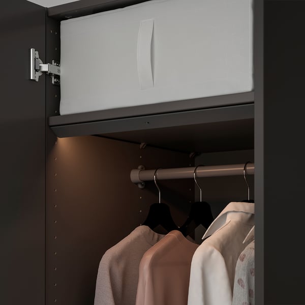 Led closet light activates when drawer opens, saving energy.