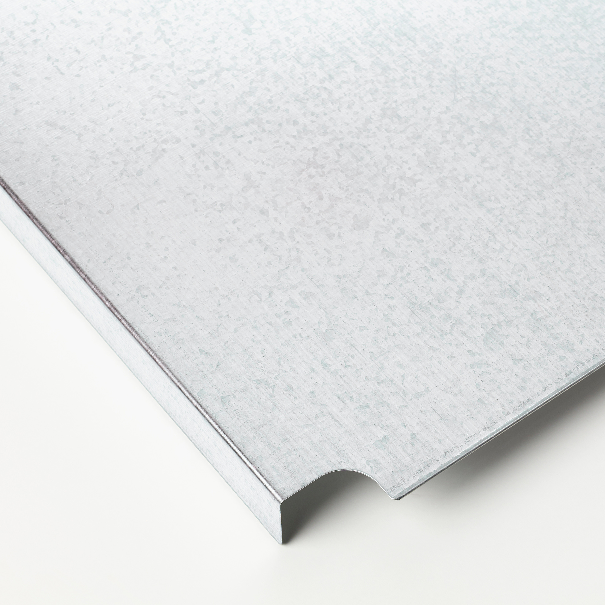 Galvanized steel shelf with a smooth, even surface, ideal for holding small items.