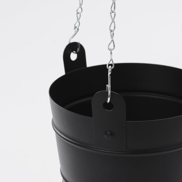 Black hanging planter with sturdy metal hooks and chains for safe plant display.