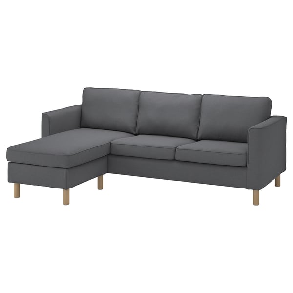 The PÄRUP sectional sofa in grey, with a modern l-shape, supported by wooden legs, designed for comfort and style.