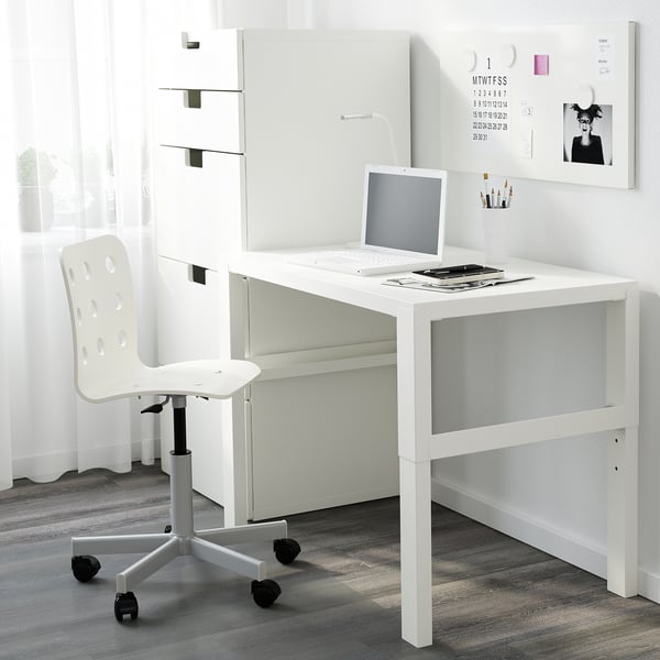 A minimalist white desk with a laptop and chair. Adjustable height and cable management, ideal for any workspace.