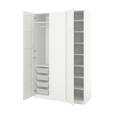 White PAX wardrobe with open doors showing storage racks and baskets.