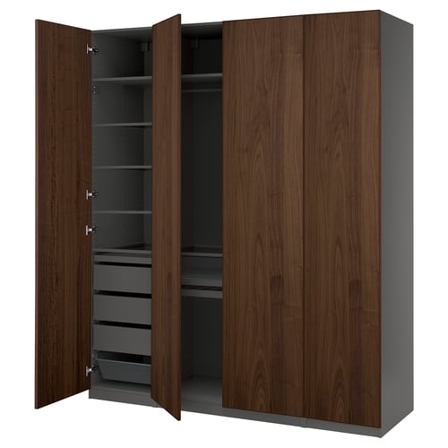 A dark brown PAX wardrobe with wooden doors and shelves, featuring interior storage solutions.