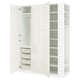 A white IKEA PAX wardrobe set with open doors revealing shelves and baskets.