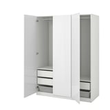 An open white PAX wardrobe featuring drawers and mesh baskets, with a sleek, minimalist design.