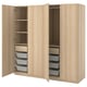 Light wood PAX closet with shelves, drawers, and hanging space.