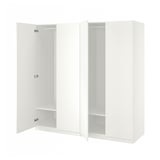 White ikea PAX wardrobe, open showing empty shelves.