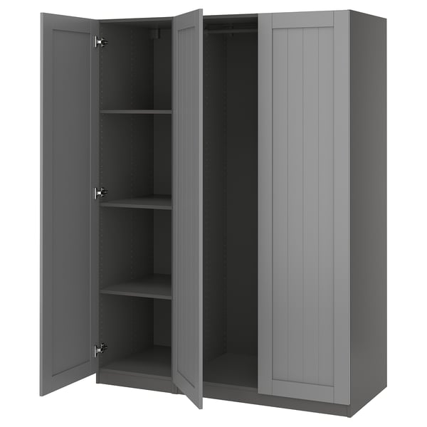 A grey ikea PAX wardrobe with open doors, revealing empty shelves.