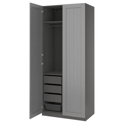 PAX gray wardrobe with shelves and drawers open.