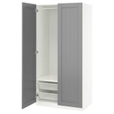 Closed wardrobe with white and gray panels, featuring one open door revealing mesh baskets and shelves inside.