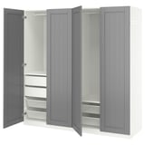 A grey ikea PAX wardrobe with open doors, revealing shelves and storage solutions.