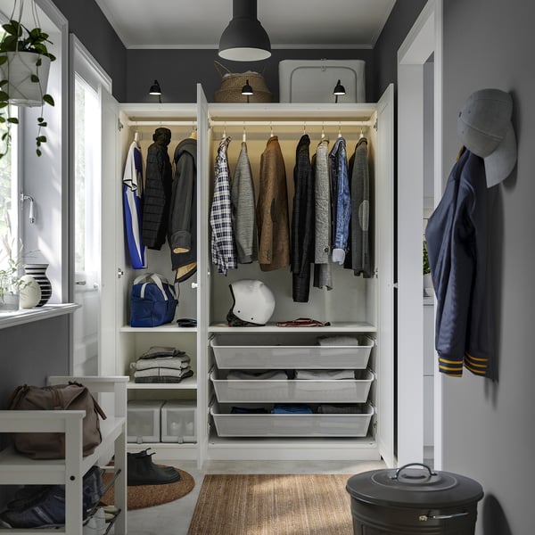 Organized wardrobe with coats, shelves, baskets, and a bench. Adjustable feet and integrated lighting.