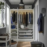 Organized wardrobe with coats, shelves, baskets, and a bench. Adjustable feet and integrated lighting.