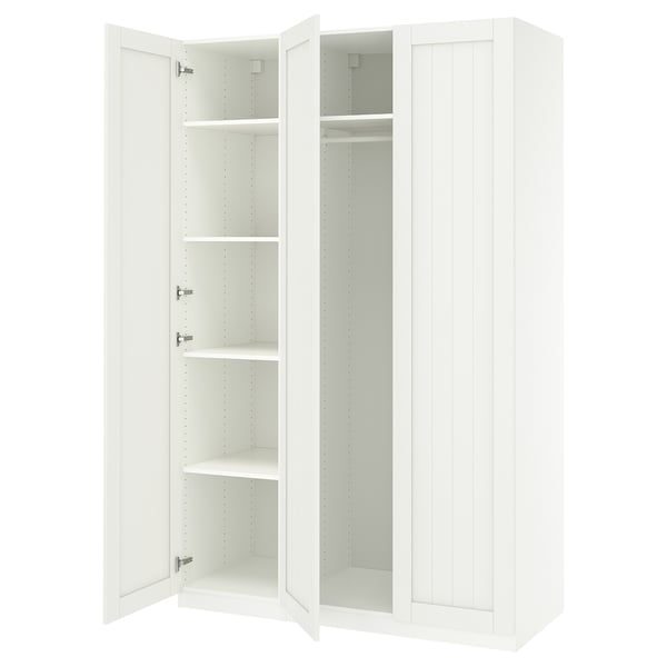A white ikea PAX wardrobe with open doors, revealing empty shelves inside.